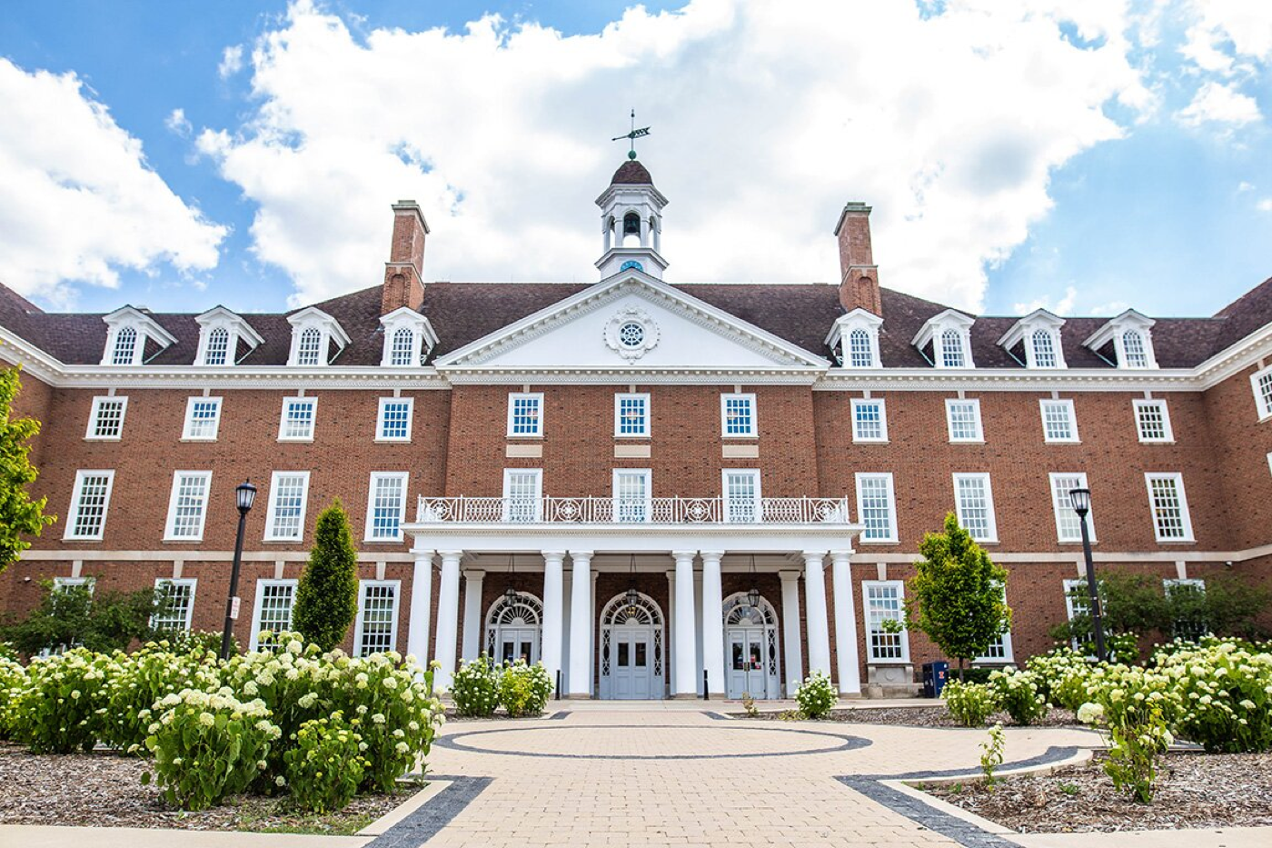 The real cupola-topped university building referenced by the pixel art